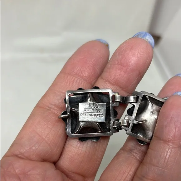 Gorgeous Hobe sterling silver floral bracelet.